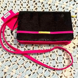 Juicy couture mini purse with black sequence and pink leather.